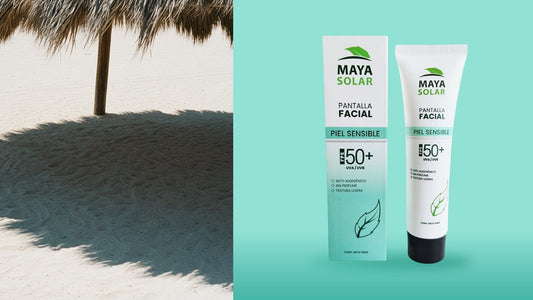 Sombra de una palapa sobre la arena blanca, junto a la Pantalla Facial Piel Sensible FPS 50+ 50 ml de Maya Solar